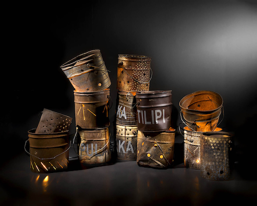 Robert Fielding Paka, Pulawa, Tilipi and Tjuka, 2018 Found flour buckets with pierced and glass - bead blasted alterations Artist credit: © Robert Fielding – Mimili Maku Arts Photo credit: Vincent Girier Dufournier