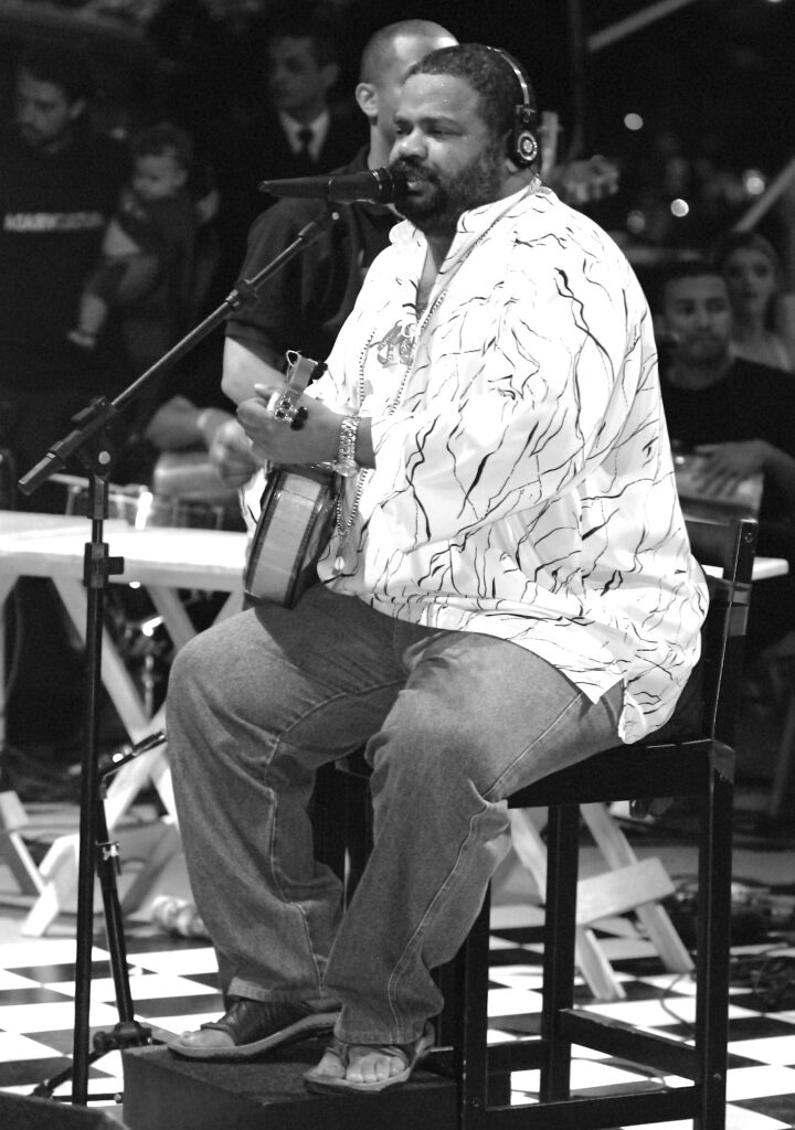 Arlindo Cruz, 2008 - Foto: © Silvio Tanaka Fonseca, As fotos da Virada!, https://www.flickr.com/photos/viradacultural2008/2445281201/ - Lizenz: https://creativecommons.org/licenses/by-sa/2.0/deed.en - Datei: https://commons.wikimedia.org/wiki/File:Arlindo_Cruz_(2445281201).jpg